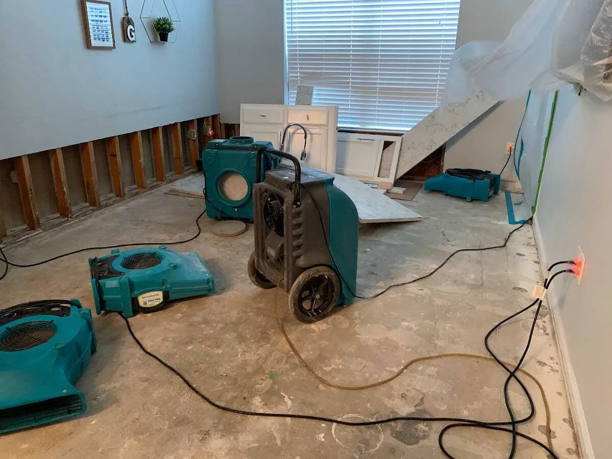 Dehumidifier in flood-cut room for Water Damage Restoration in Hartford